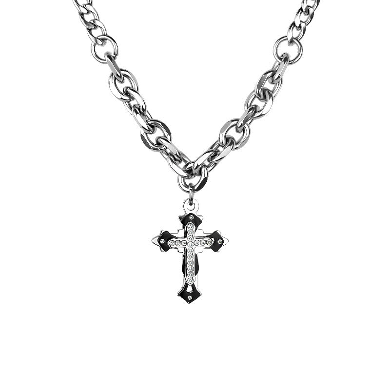 Silver chain necklace with rhinestone-studded cross pendant