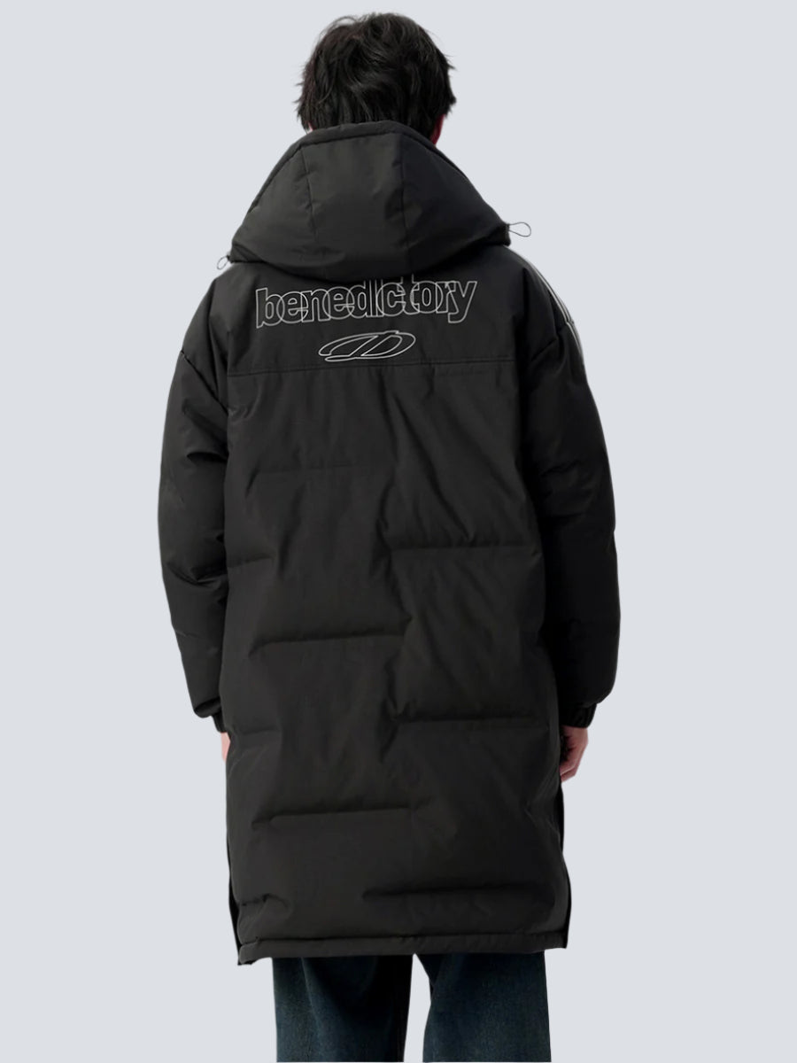 A man is shown from behind against a gray backdrop. Wearing black long puffer jacket with 'benedictory' text and logo embroidered across the upper back