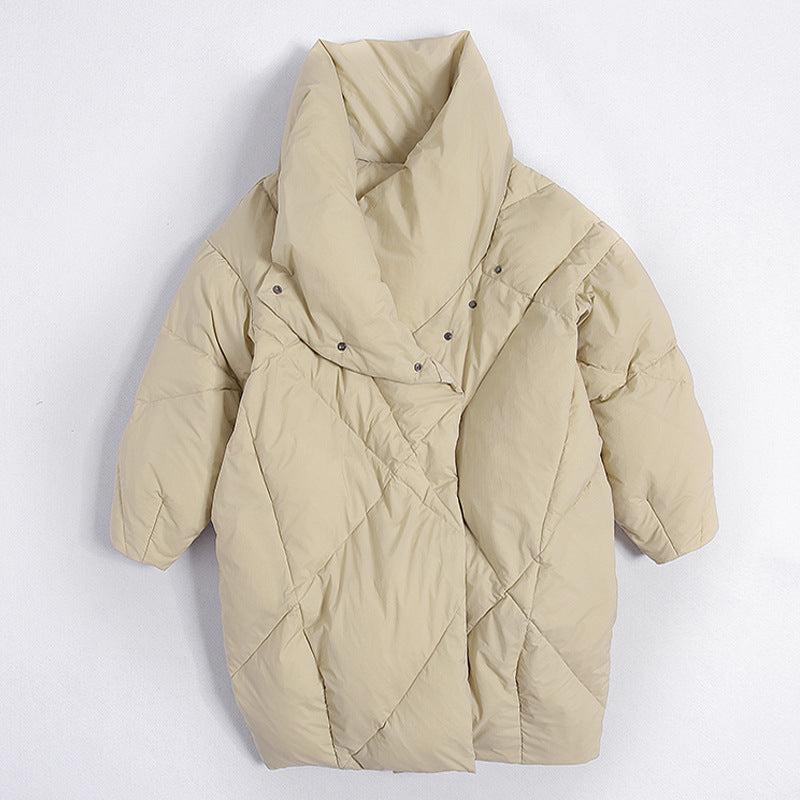 Beige quilted puffer coat with oversized collar and asymmetric button closure displayed flat against white background