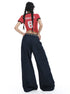 Back view of dark denim wide-leg jeans worn with a red graphic crop top.