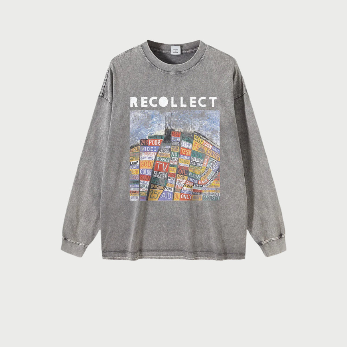 A gray oversized "RECOLLECT" sweatshirt with a colorful collage print is displayed flat against a white background