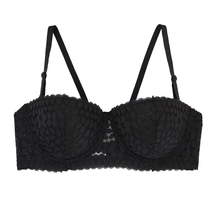 A black lace balconette bra with intricate floral lace, adjustable straps, and a supportive underwire design, displayed against a white backdrop