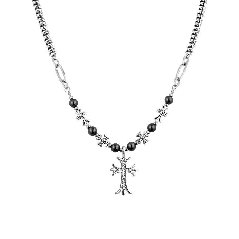 Product photo of silver chain necklace with black beads and crystal cross pendant