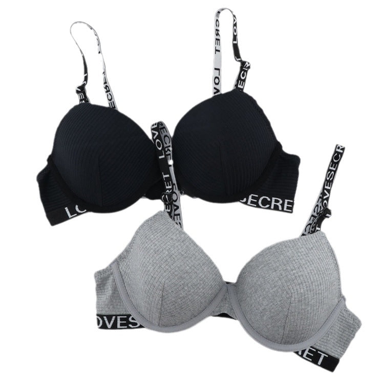 Two push-up bras with logo straps - black ribbed and heather gray textured styles