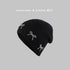 Black beanie with multiple pearl-studded bow decorations, displayed against a gray background with "Fashion Trends X Seasonal Trend" text