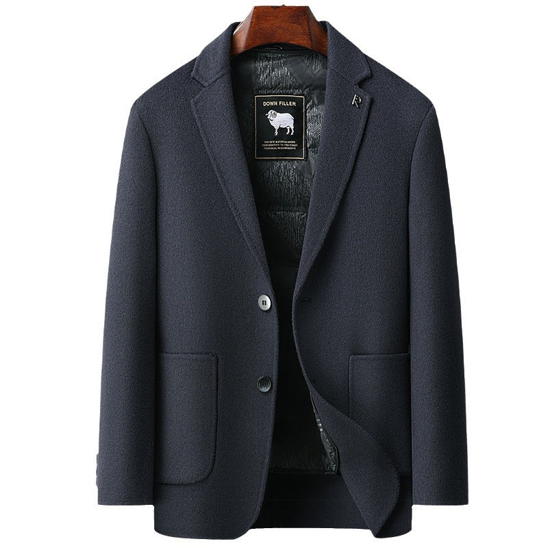 Navy wool blazer with DOWN FILLER sheep logo tag on wooden hanger, featuring two-button closure and quilted lining