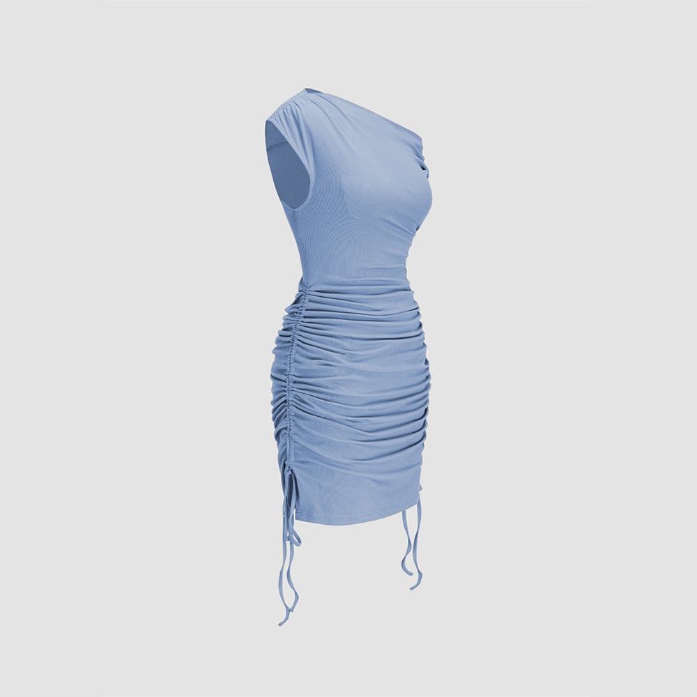 Light blue ruched dress on mannequin showing side drawstring detail and form-fitting silhouette
