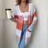 Color-block cardigan, white crop top, holding coffee, denim jeans