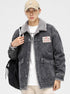 Model with beige cap wearing gray sherpa-lined denim jacket, white tee and black backpack. Features vintage OP patch