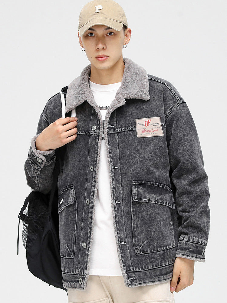 Model with beige cap wearing gray sherpa-lined denim jacket, white tee and black backpack. Features vintage OP patch
