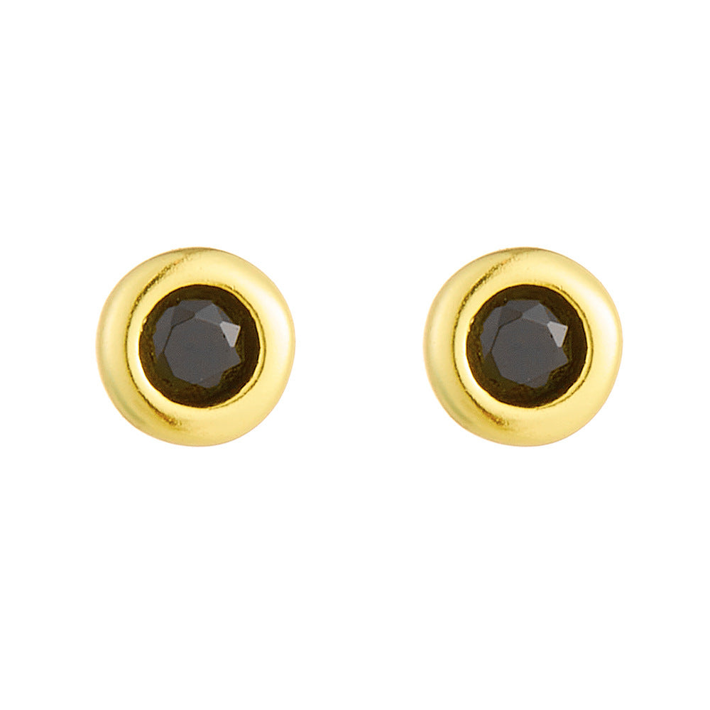 Front view of gold-plated round studs with bezel-set black nano zirconia stones