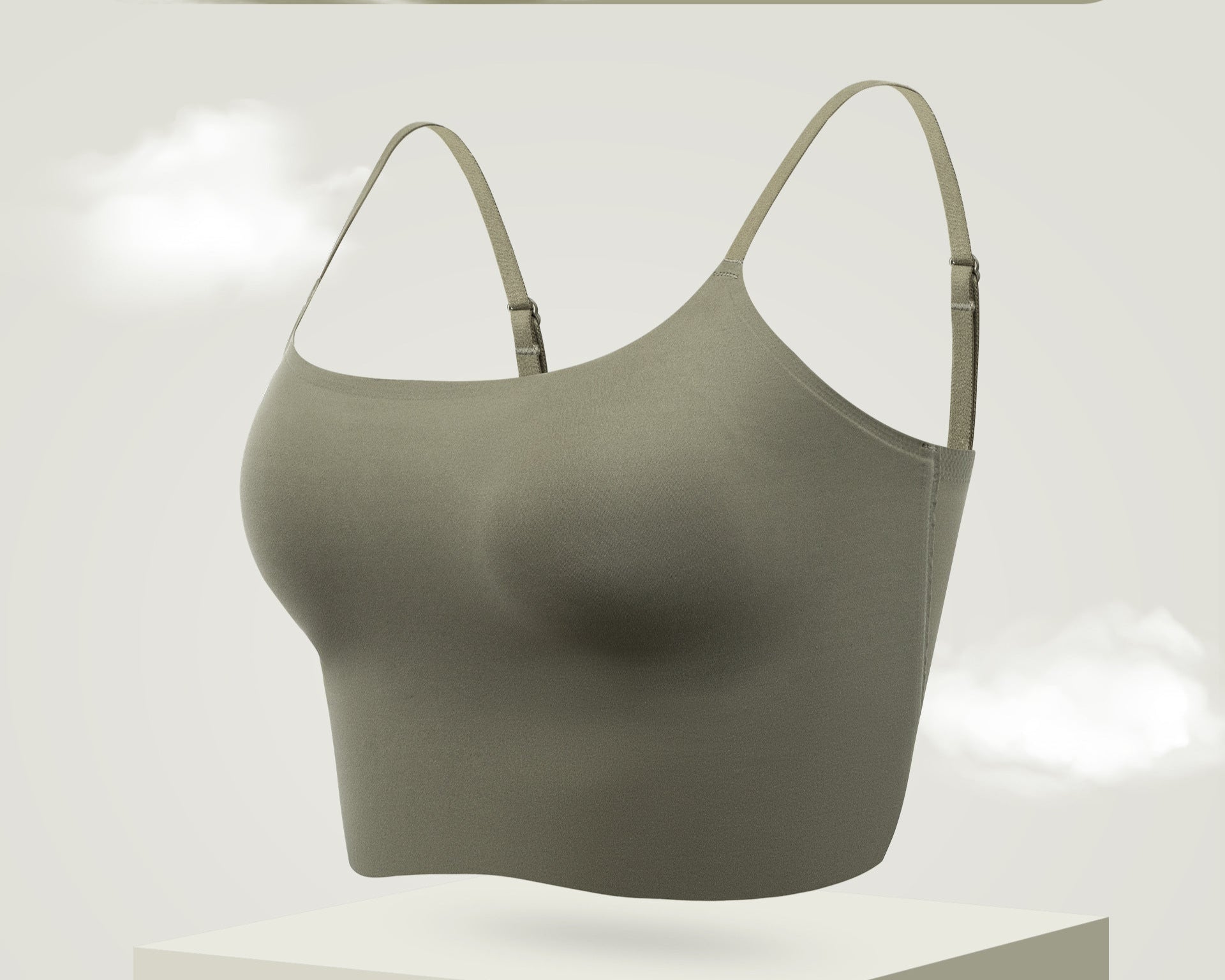 Minimalist olive green spaghetti strap bra with a seamless finish, offering a second-skin feel.