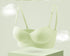 Light green strapless bra with molded cups and a bow detail on the band.