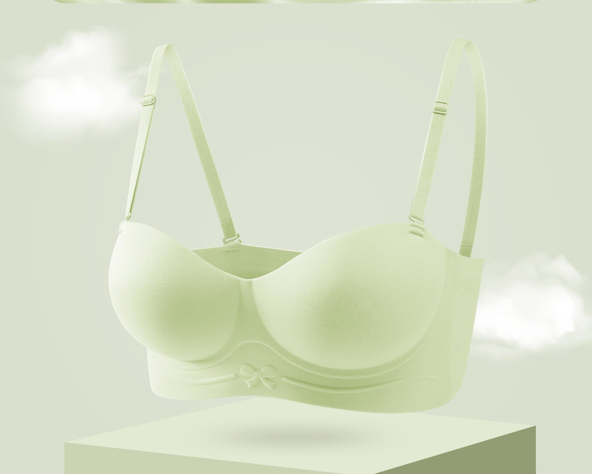 Light green strapless bra with molded cups and a bow detail on the band.