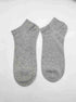 Pair of lightweight heather gray ankle socks with ribbed cuffs on white background