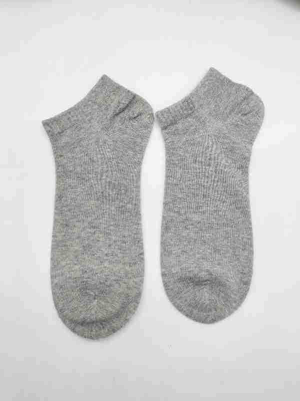 Pair of lightweight heather gray ankle socks with ribbed cuffs on white background