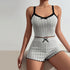 Light grey ribbed pajama set with black lace trim and bow details, front view showing fitted silhouette