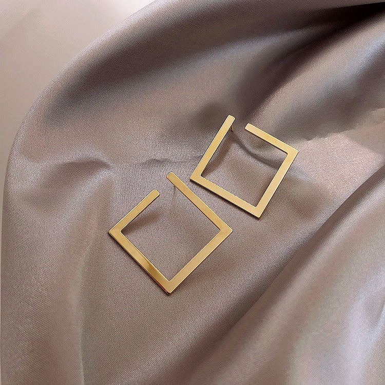 Modern square drop earrings in brushed gold finish