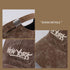 Close-up details of brown corduroy cap showing adjustable metal closure and embroidered logo texture