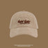 Beige corduroy baseball cap with brown 'NEW YORK' embroidered logo
