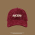 Burgundy corduroy baseball cap with white 'NEW YORK' logo