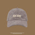 Light grey corduroy baseball cap with white 'NEW YORK' embroidery