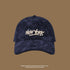 Navy blue corduroy baseball cap with white 'NEW YORK' embroidered text