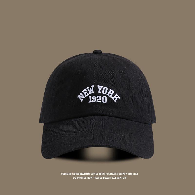 Black baseball cap featuring white embroidered "New York 1920" text