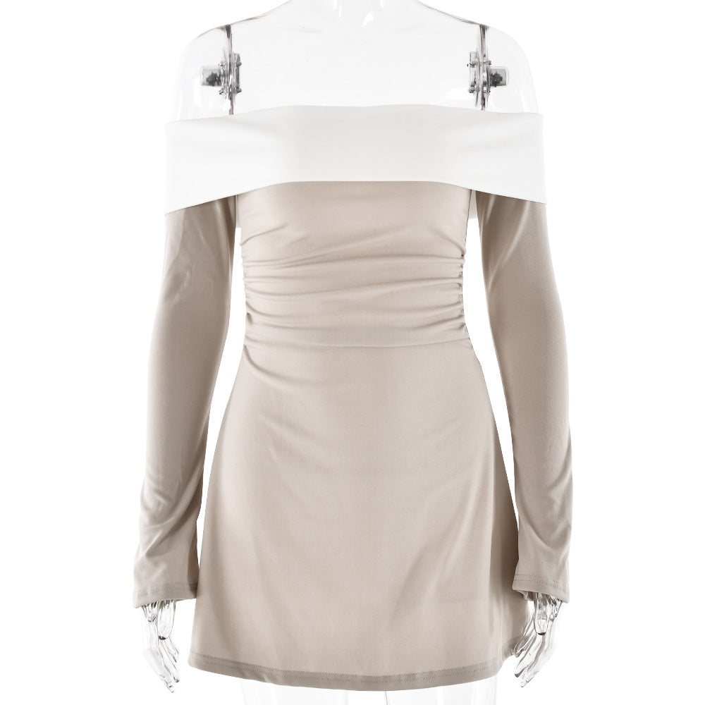 Product photo of a cream mini dress with white off-shoulder detail and ruched waist on a mannequin