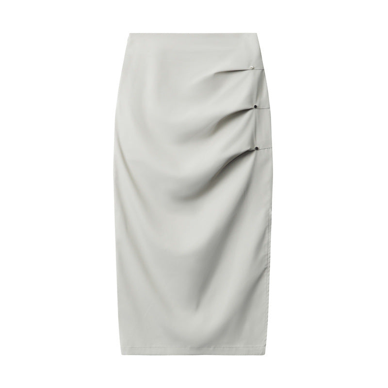 Beige midi skirt with architectural pleating and side slit, perfect for professional attire