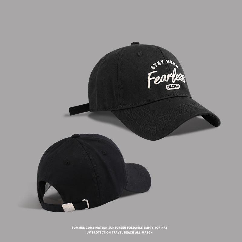 Front and back view of black Stay Hard Fearless baseball cap showing adjustable strap