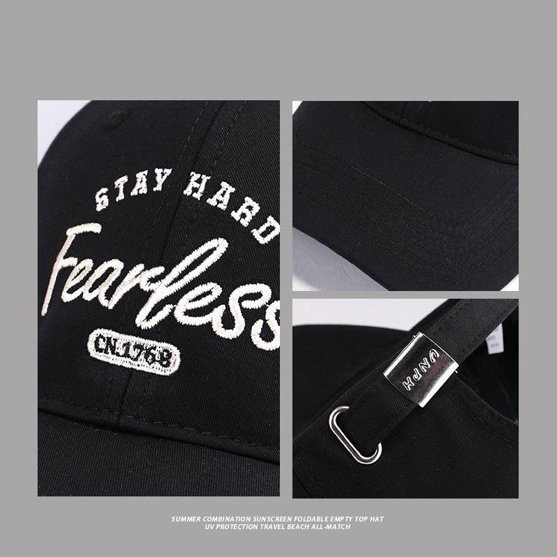 Detail shots of Stay Hard Fearless embroidery and strap closure