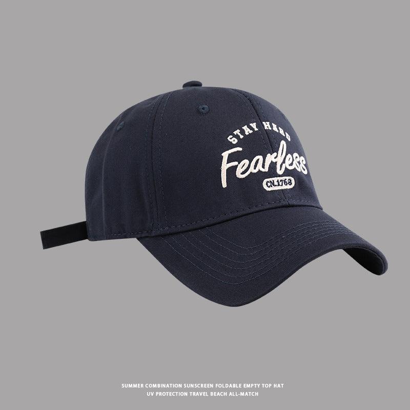 Navy baseball cap with white Stay Hard Fearless embroidery