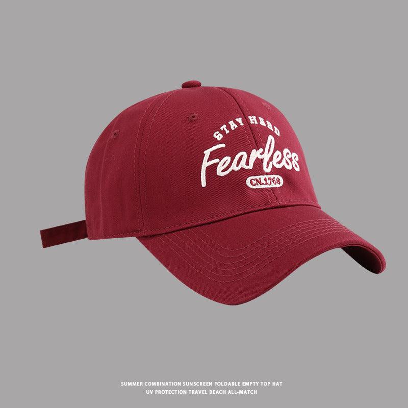 Wine red baseball cap featuring white Stay Hard Fearless text