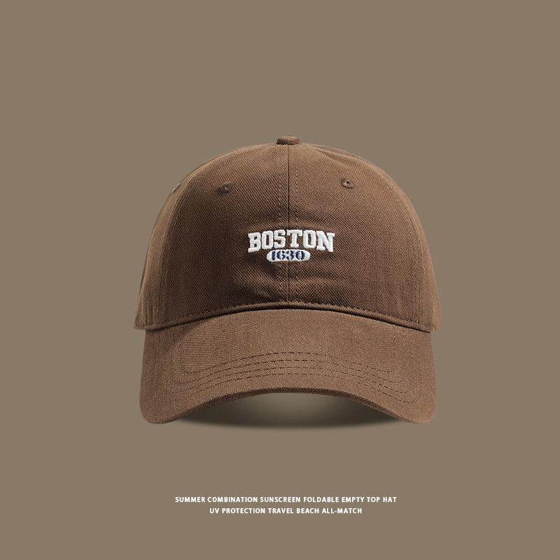 Coffee brown cotton baseball cap with white Boston 1630 logo embroidery