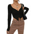 Model wearing black version of twist-front crop top styled with brown jeans and silver chain accessories
