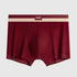 Burgundy men's boxer briefs with 'LUCK' logo and cream elastic waistband displayed against light gray background