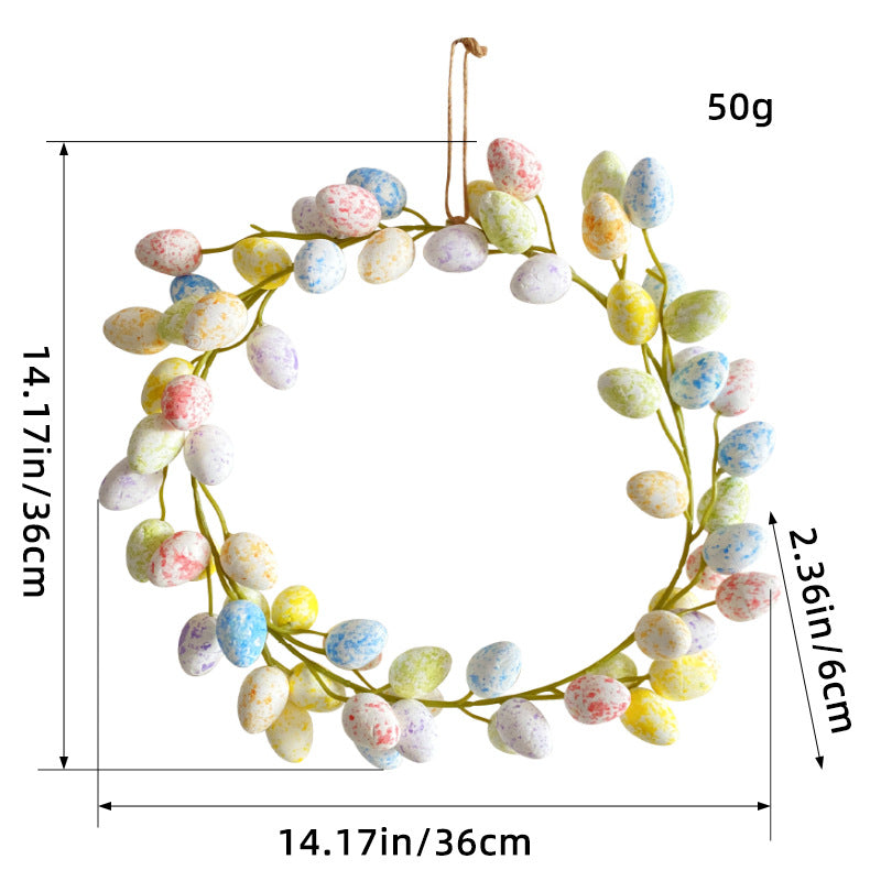 A pastel-colored Easter egg wreath with dimensions labeled, measuring 14.17 inches in diameter and 50g in weight.