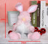 Pink Easter bunny gnome plush doll with long ears, a white beard, and black houndstooth legs, measuring 43cm in height and 20cm in width.