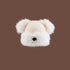 White Dog Nose Plush Knit Beanie with plush faux fur trim and pom pom ears against brown backdrop