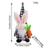 Easter gnome plush with bunny ears, plaid hat, and carrot, displayed with dimensions of 27cm height, 12cm width, and 7.5cm depth.