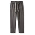 Gray pants with white drawstring and elastic waistband