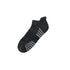 Black performance ankle sock with grey ventilation stripes and anatomical cushioning for enhanced comfort