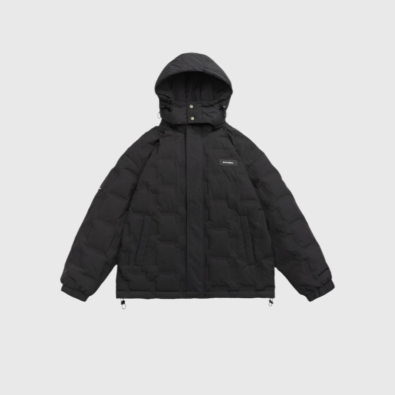 Close-up detail of olive puffer jacket showing black zipper, snap closure and elastic cuff detail