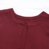 Close-up of the round neckline and ribbed texture of the burgundy sleeveless top.