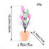 Pink polka dot Easter egg tree with size details featuring pastel green and pink spotted eggs on a small artificial tree.