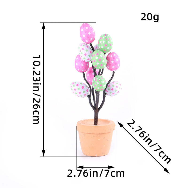 Pink polka dot Easter egg tree with size details featuring pastel green and pink spotted eggs on a small artificial tree.