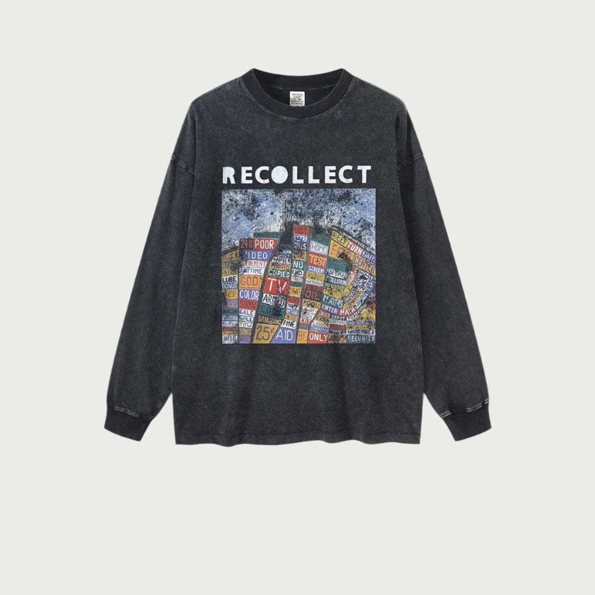 A black oversized "RECOLLECT" sweatshirt with a colorful collage print is displayed flat against a white background