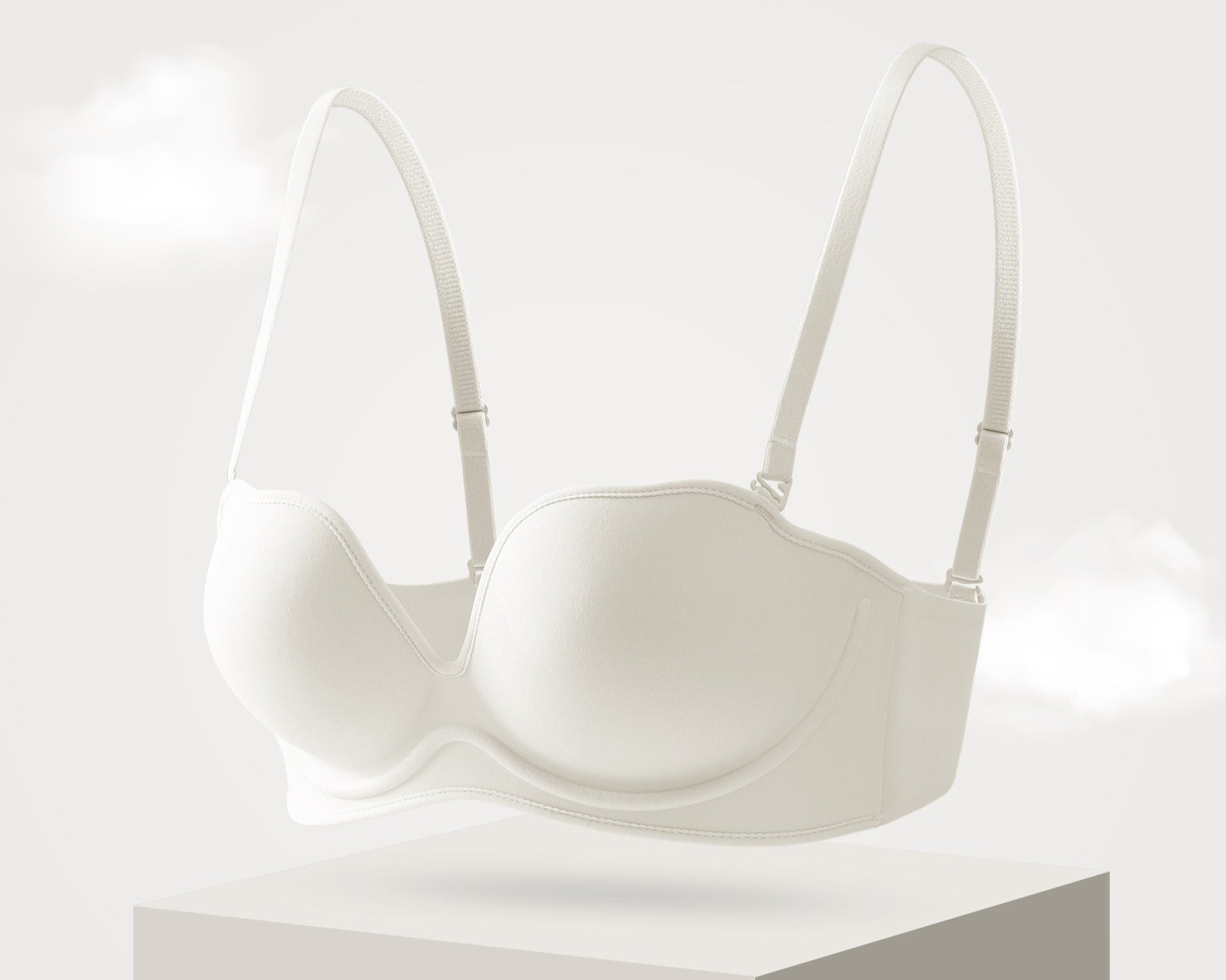 White seamless strapless push-up bra designed for lift and support with a smooth, breathable fabric.