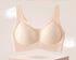 Beige seamless bra with breathable design on a pedestal.